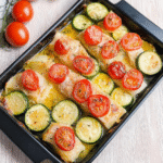Leckeres Ofenlachs mit Tomaten und Zucchini Rezept - Titelbild